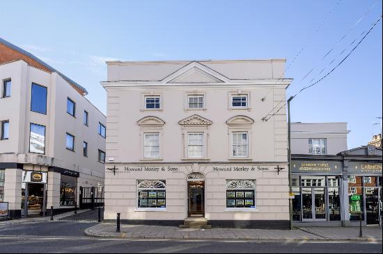 A prominent and historic Grade II listed mixed use property occupying a prime location on 