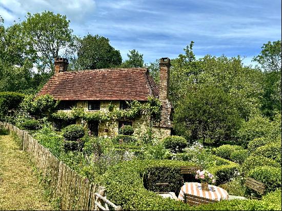 A beautiful Grade II listed cottage with a swimming pool in an exquisite position within t