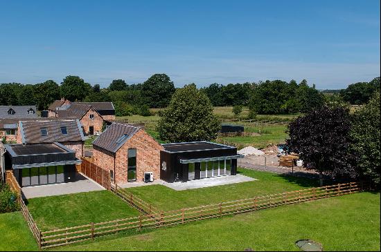 A contemporary three bedroom new home situated within an exclusive development of barn con