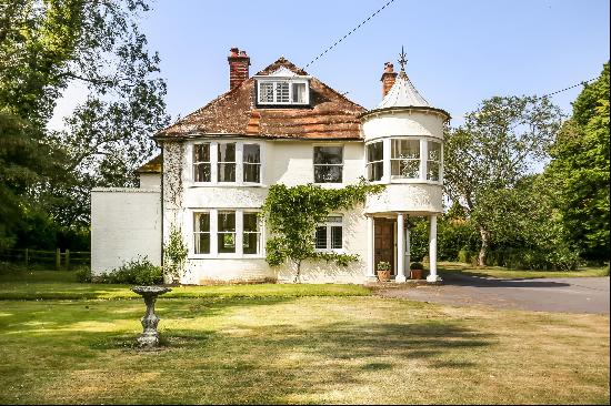 An exceptional family house in an elevated position within the village.