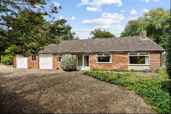 Detached bungalow in edge of village location