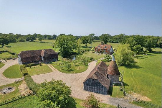 A wonderful rural estate in the delightful, secluded setting with farmhouse, oast house an