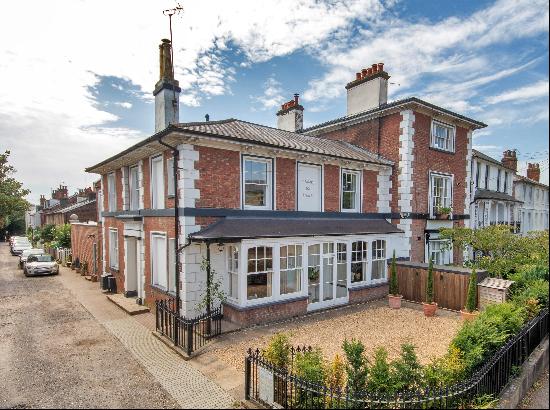 An immaculately presented 5 bed attached Victorian house for sale in the 'village' area of