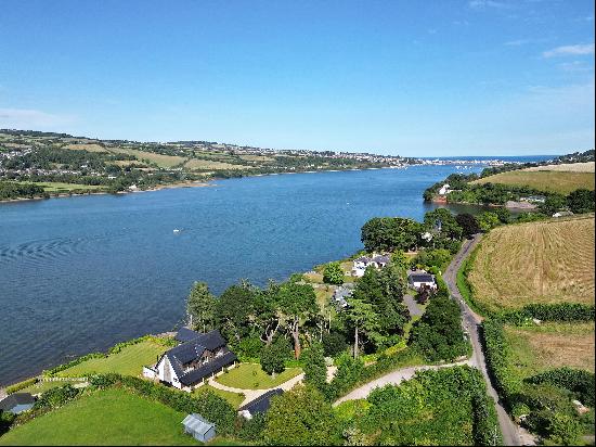 A stylish, luxury family home in a beautiful riverside setting