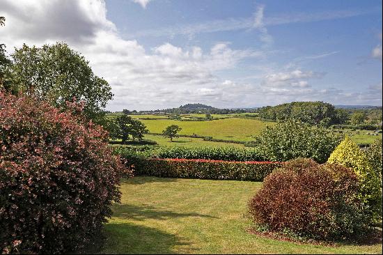 A stylish five-bedroom family home with contemporary fittings and beautiful countryside vi