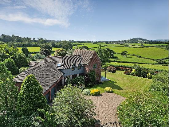 A stylish five-bedroom family home with contemporary fittings and beautiful countryside vi