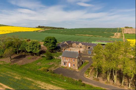 A charming Borders farmhouse set in 1.8 acres with beautiful views and steading buildings