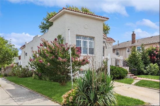 Welcome to this beautiful corner property nestled in the heart of Long Beach. This charmin