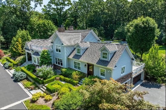 OLD WESTBURY. The Epitome of Luxury, in this pristine Hamptons-style Colonial, sitting hig