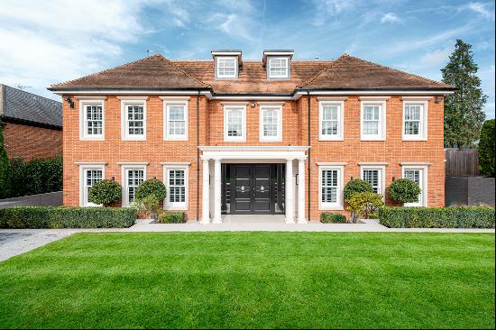 Family home lying on a private gated road in Cobham