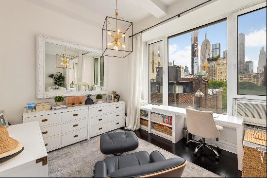 Residence 7B at 21 East 22nd Street is a beautifully designed high-floor loft situated 