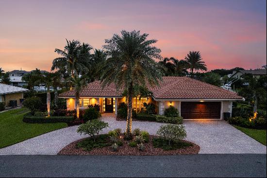 This impeccably renovated 3-bedroom, 2-bath , 2-car garage pool home is nestled in the cha