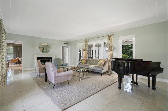 Step Inside With Me! Sunset Island IIs premier corner offers a Palm Beach style Colonial h