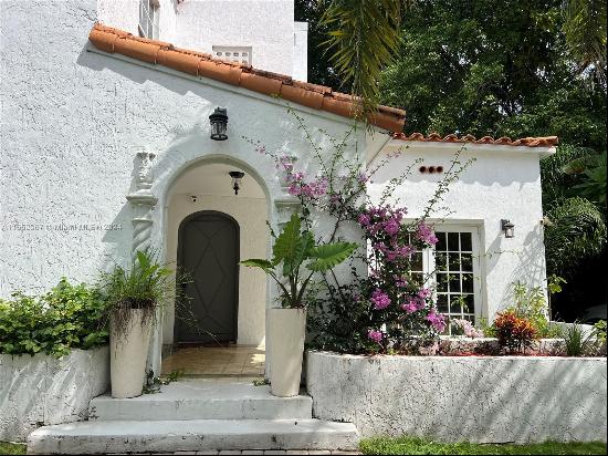 Charming Spanish-style home in one of the most desirable neighborhoods! This beautifully m