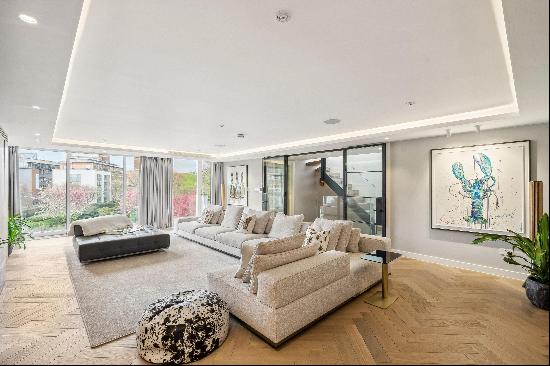 An exceptional freehold house within a private gated mews, just off Bermondsey Street, wit