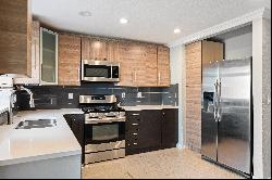 Beautifully updated condo that feels and lives more like a townhome