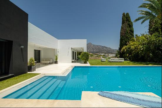 A spacious seven bedroom villa with incredible golf and sea views.