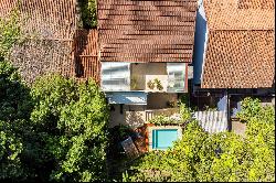 Renovated house with contemporary design on a tree-lined street