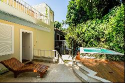 Renovated house with contemporary design on a tree-lined street