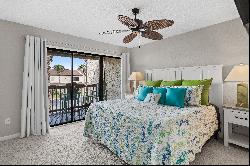 End Unit With Community Pool And Gated Walkway To Beach