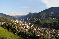 Modern chalet with panoramic view of the Dolomites