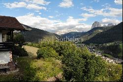 Modern chalet with panoramic view of the Dolomites