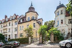 Altbau-Flair: Reizende 3-Zimmer-Wohnung mit Südgarten und Hobbyräumen in Toplage