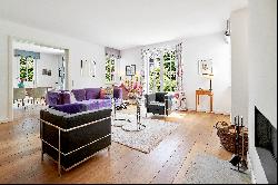 Family home with an elegant country house look, dream garden and separate guest apartment