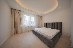 Designer two-bedroom apartment in a gated complex for rent