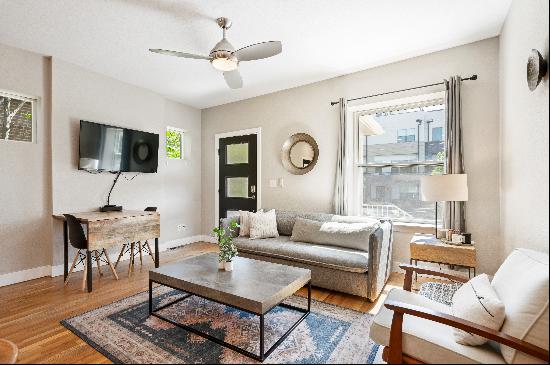 Welcome to this Exquisitely Renovated Half-Duplex!