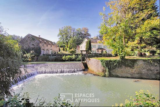 transformed former mill with outbuildings