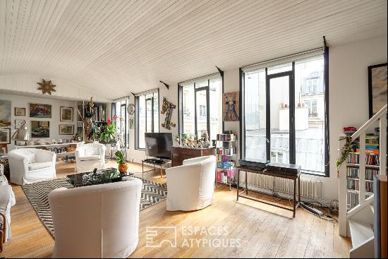 light-filled duplex on the top floors