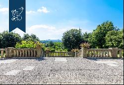 Luxurious castle surrounded by a 100-hectare park for sale between the Langhe area and the