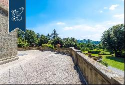 Luxurious castle surrounded by a 100-hectare park for sale between the Langhe area and the