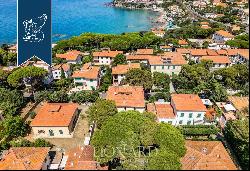 Unique property with garden and outbuilding for sale in Castiglioncello