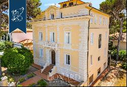 Unique property with garden and outbuilding for sale in Castiglioncello