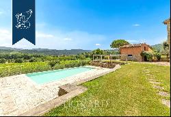 Renovated farmhouse with a swimming pool, olive grove and panoramic view just outside the 