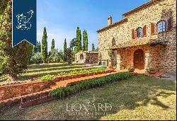 Typical, renovated Tuscan villa with an olive grove for sale south of Livorno, a few minut