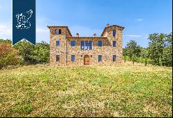 Luxury villa with agricultural grounds and hospitality potential for sale in Maremma