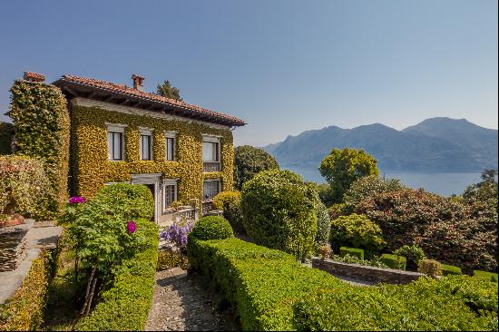 Early 20th century villa with centuries-old park and lake view