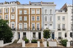 Beautiful family home in one of Notting Hill’s best-loved streets