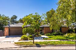 A Large Ron Molen Home with a Pool