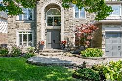 Private Yard + Heated 3-Car Garage