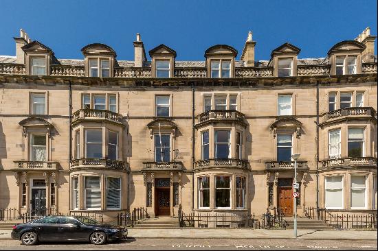 Rarely available two-bedroom ground floor apartment, located in Edinburgh's West End.