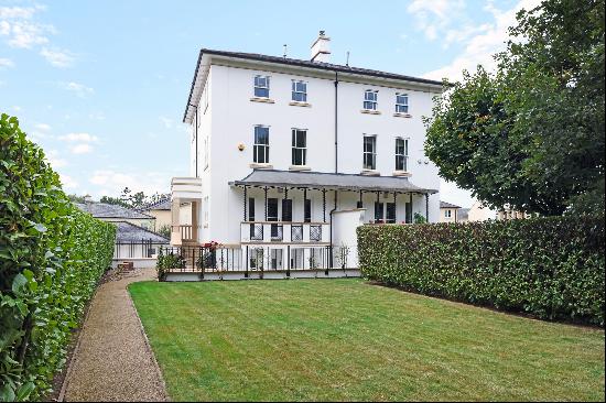 A stunning modern town house built in a period style with gardens, garaging and self-conta