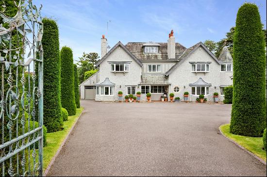 A highly desirable and exceptional detached family home situated on a private road within 