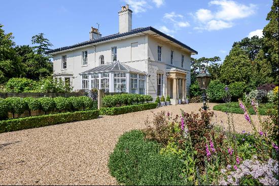 A fine example of an early 1800’s Grade II listed town villa, situated on a large private 