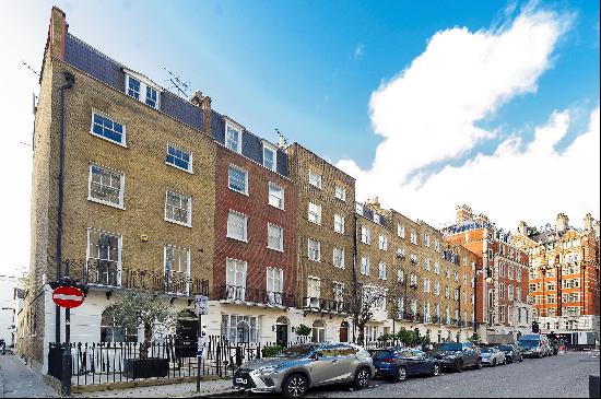 An impressive four bedroom townhouse with a lift to rent in prime Belgravia, SW1.