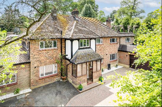 An outstanding family home located on one of Sevenoaks' most prestigious private roads in 