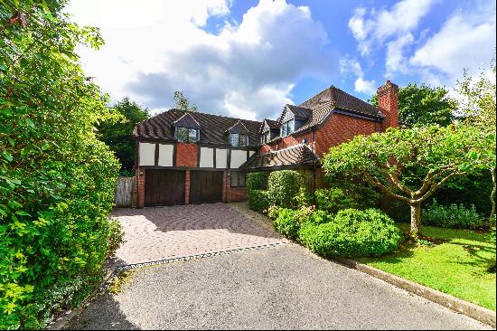 A superb five bedroom family home located in a quiet Cul-de-Sac with wonderful gardens and